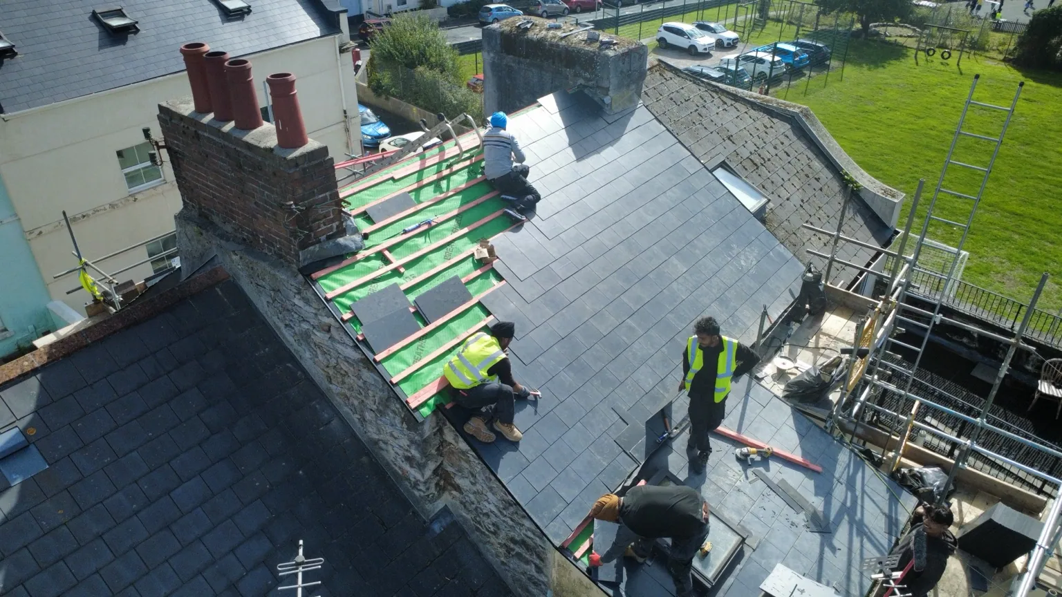 Installing the new roof covering — Shield Roofing real project photograph