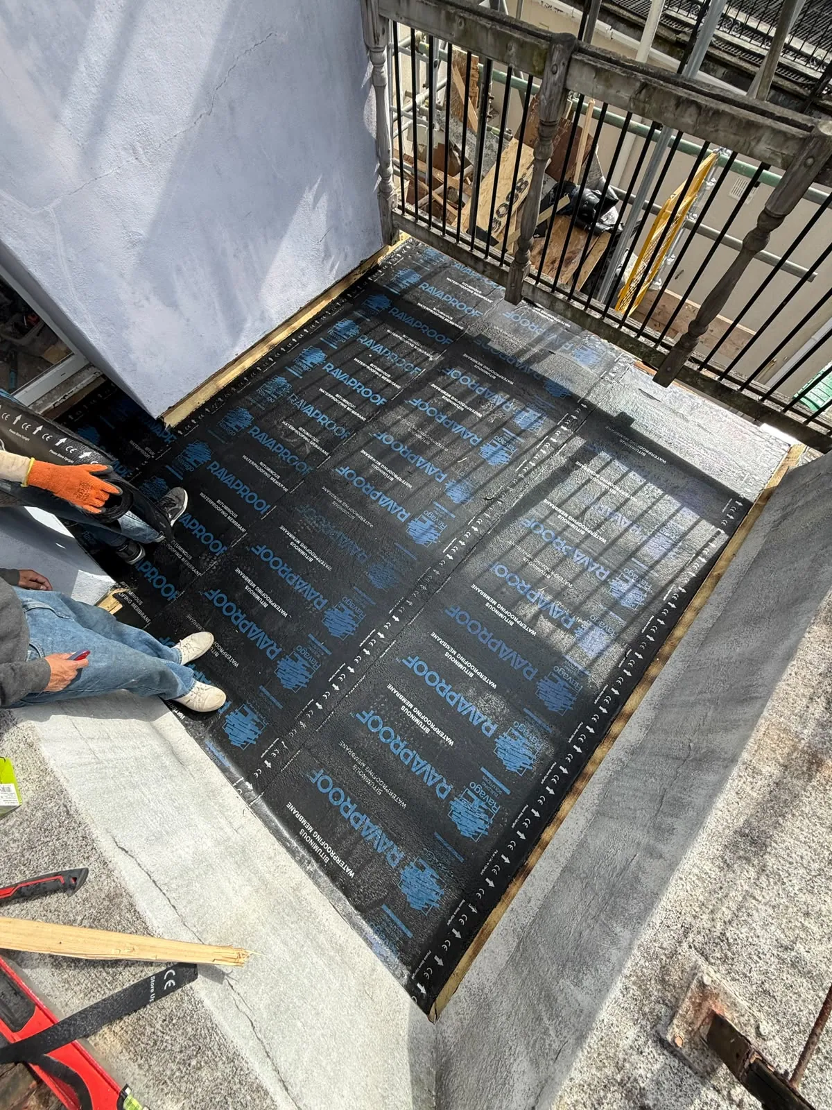 A waterproofing layer beneath the finish — Shield Roofing real project photograph