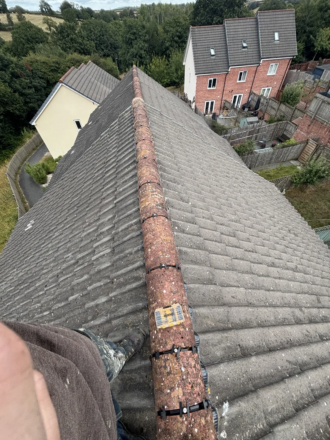 Completed mechanically fixed dry ridge system by Shield Roofing